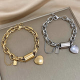 Pulsera gruesa con corazones | Oro