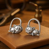 Aretes de cachorro durmiendo hechos de plata de ley